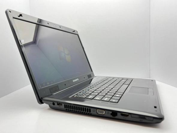 Ноутбук GIGABYTE E1500 / 15.6&quot; (1366x768) TN / Intel Pentium T4400 (2 ядра по 2.2 GHz) / 4 GB DDR2 / 320 GB HDD / Intel GMA Graphics 4500M / Акб не держит - 3