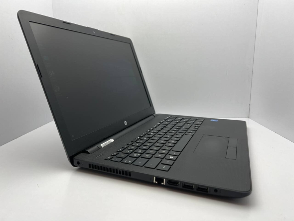 Ноутбук HP 15-bs036ng / 15.6&quot; (1366x768) TN / Intel Celeron N3060 (2 ядра по 1.6 - 2.48 GHz) / 4 GB DDR3 / 128 GB SSD / Intel HD Graphics 400 / WebCam - 3