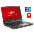Ноутбук Fujitsu LifeBook E547 / 14" (1920x1080) IPS / Intel Core i5-7200U (2 (4) ядра по 2.5 - 3.1 GHz) / 8 GB DDR4 / 256 GB SSD / Intel HD Graphics 520 / WebCam / Windows 10 Pro - 1