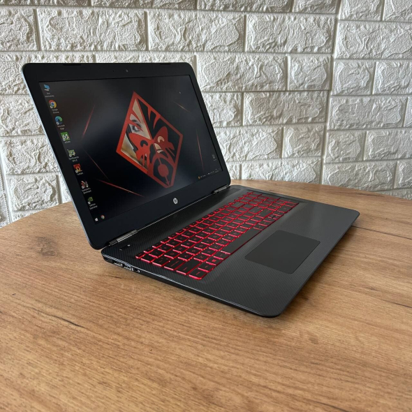 Игровой ноутбук HP Omen 15-ax256nr / 15.6&quot; (1920x1080) IPS / Intel Core i7-7700HQ (4 (8) ядра по 2.8 - 3.8 GHz) / 8 GB DDR4 / 128 GB SSD + 1000 GB HDD / nVidia GeForce GTX 1050, 2 GB GDDR5, 128-bit / WebCam - 4