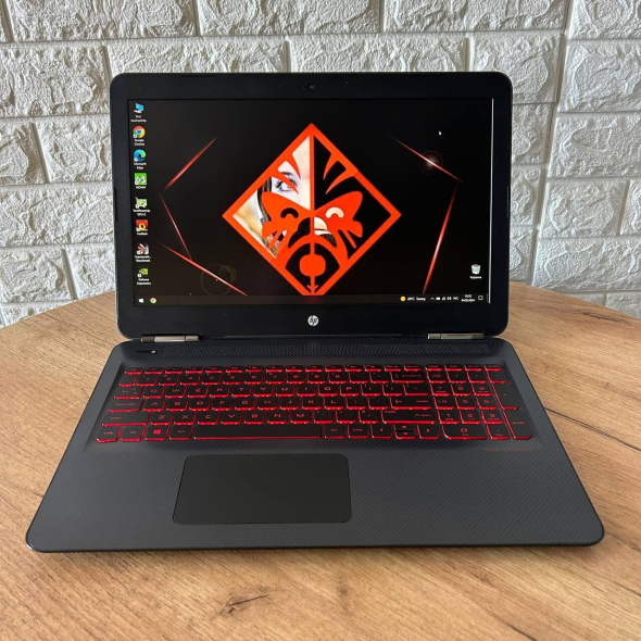 Игровой ноутбук HP Omen 15-ax256nr / 15.6&quot; (1920x1080) IPS / Intel Core i7-7700HQ (4 (8) ядра по 2.8 - 3.8 GHz) / 8 GB DDR4 / 128 GB SSD + 1000 GB HDD / nVidia GeForce GTX 1050, 2 GB GDDR5, 128-bit / WebCam - 2