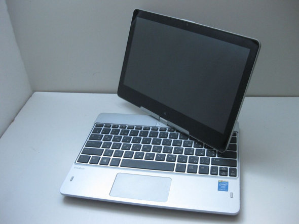 Ноутбук-трансформер HP EliteBook Revolve 810 G2 / 11.6&quot; (1366x768) IPS Touch / Intel Core i7 - 4600U (2 (4) ядра по 2.1-3.3 GHz) / 8 GB DDR3 / 256 GB SSD / Intel HD Graphics 4400 / WebCam - 9
